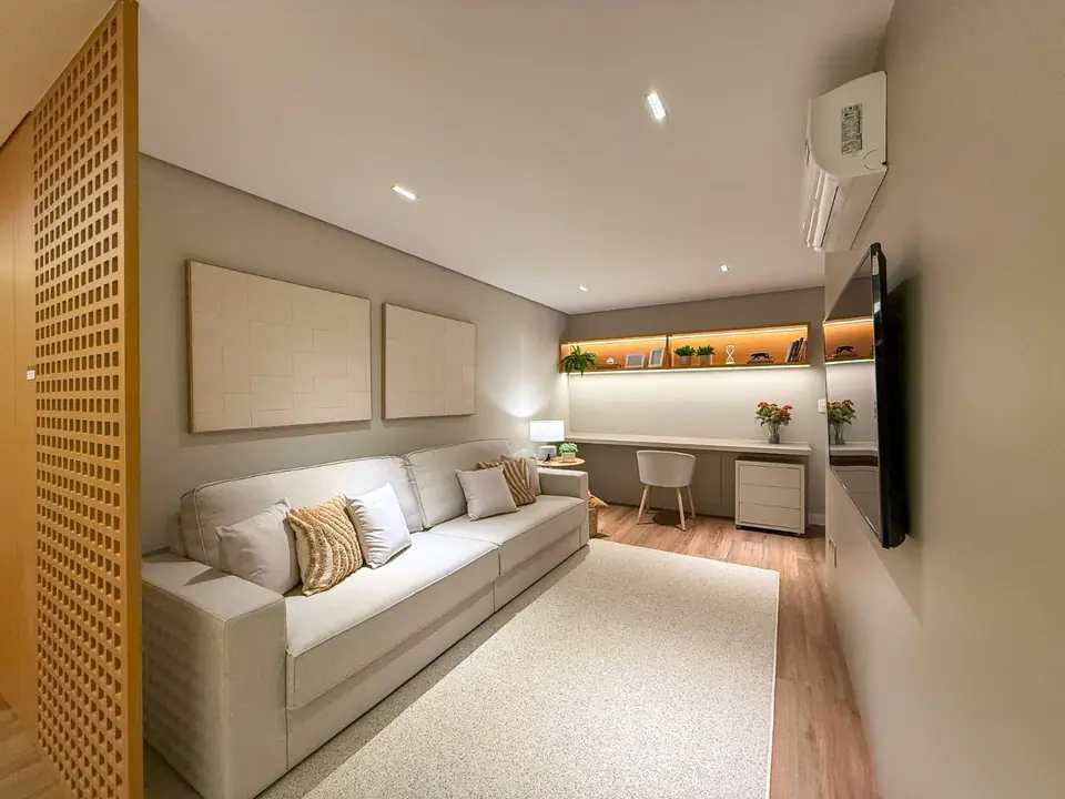 Home theater com office do apartamento decorado do Reserva Bela Vista